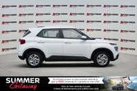 Navigate urban landscapes effortlessly in the 2024 Hyundai Venue Preferred Sport Utility, designed f... (image 6)