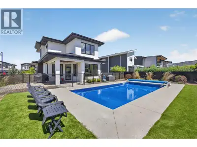 Nestled within the prestigious community of The Ponds in Upper Mission, this exceptional 5-bedroom r...