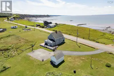 Enjoy over 800 feet of waterfront on the breathtaking Bay of Fundy! This charming seaside home is ne...