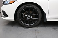 The 2024 Honda Civic Sport is equipped with a 2.0L 4-cylinder engine paired with a smooth front-whee... (image 3)
