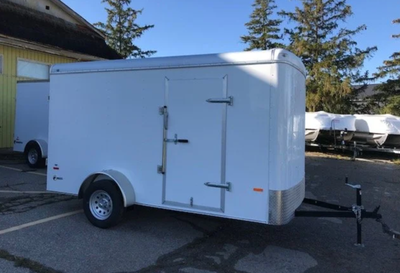 Haul-About Lynx 6 x 12 Enclosed Trailer with curb side door and rear ramp door. Call today for a cus...