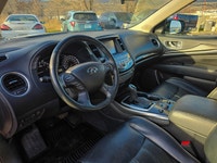 The 2017 INFINITI QX60 AWD in elegant white is a true performer with its reliable all-wheel drive an... (image 8)