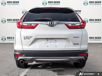 Experience the reliability and power of the 2017 Honda CR-V Touring in stunning white, equipped with... (image 4)