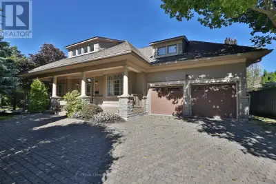 Hands-off living in a fully-detached 2573 sq ft Bungalow, with Loft upgrade, and coveted covered por...