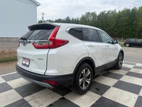A practical compact SUV with a spacious interior, efficient performance, and modern safety features,... (image 3)