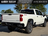 The 2026 Chevrolet Silverado 2500HD Custom is a striking white truck with a powerful 44 drivetrain t... (image 3)