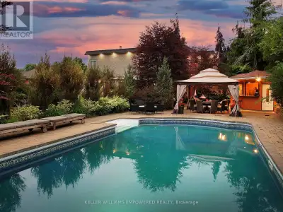 Sitting on a fantastic 1.01 acres in prestigious Woodland Acres, this custom-built estate offers ult...