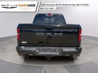 The 2026 Ram 1500 Sport is a striking truck in a bold black finish with a powerful 4x4 drivetrain, p... (image 3)