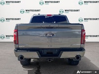 Introducing the sophisticated 2024 Ford F-150 XLT in a pristine white finish with a 4 4 drivetrain a... (image 4)