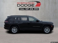 This Jeep Grand Cherokee L has a strong Regular Unleaded V-6 3.6 L/220 engine powering this Automati... (image 2)