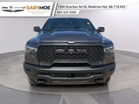 The 2026 Ram 1500 Rebel is the epitome of rugged sophistication. This Gray beauty, equipped with 44... (image 5)
