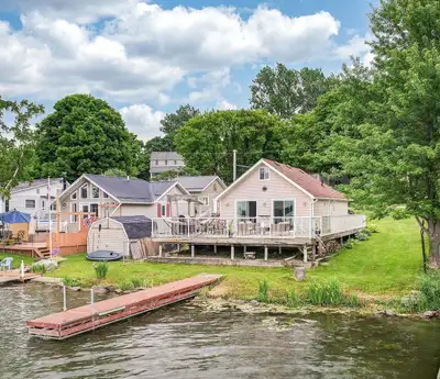Waterfront Cottage with Private Dock, Boat Launch, Spacious Deck, Stunning Sunset View Summer fun pl...