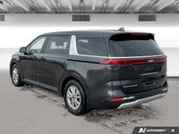 This *2023 Kia Carnival LX* blends minivan practicality with SUV-inspired styling. Powered by a smoo... (image 2)