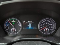 The 2022 Hyundai Santa Fe Hybrid Preferred in sleek Black with an AWD drivetrain offers balanced han... (image 7)