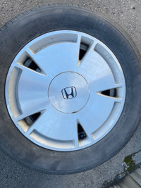 4 Aluminum Wheels and Tires were on a 2009 Honda Fit
