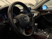 The 2012 Audi A6 3.0T Premium Plus marks a significant peak in the mid-size luxury sedan segment, bl... (image 4)