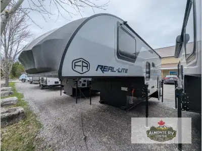 Palomino Real-Lite hard side truck camper HS-1806 highlights: Two Storage Chests Refrigerator Hot/Co...