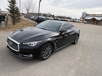 The 2017 Infiniti Q60 Premium is a luxurious 2-door coupe, often featuring a 300-horsepower 3.0L twi... (image 4)
