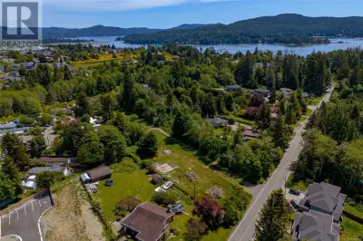 2.35 acres of Prime development opportunity in the heart of Sooke. This centrally located RM2-zoned...