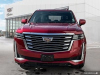 The 2021 Cadillac Escalade includes a panoramic sunroof, power-retractable running boards, hands-fre... (image 7)