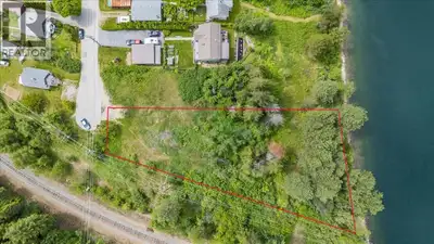 Rare waterfront development opportunity! Situated on a stunning 0.69-acre property with 144 feet of...