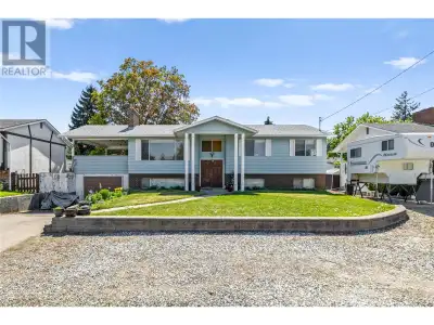 Charming single-family home with a spacious yard and endless potential—create your dream space! This...