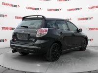 This outstanding example of a 2005 Toyota Matrix XR | 5 SPEED | AIR CONDITIONING | POWER LOCKS | BLU... (image 4)