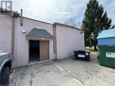 Non temperature controlled storage space lights only, no heat, as is. 8 ft tall drive in door. Two r...