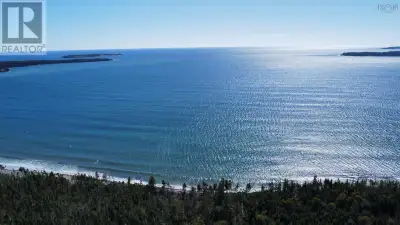 Nestled along the stunning South Shore of Nova Scotia, this exceptional 7-acre oceanfront property i...