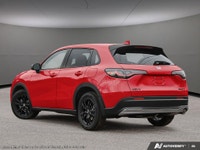 Get behind the wheel of the vibrant red 2027 Honda HR-V Sport AWD, engineered for all-weather condit... (image 3)