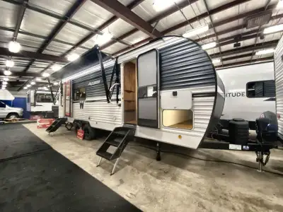 Winnebago Access travel trailer 25RK highlights: Rear Kitchen Booth Dinette 66in.in. x 80in.in. Olym...