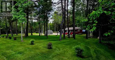 Welcome to Cottage Country. Peace & tranquility await. This sweet cottage with rustic charm, and mod...