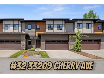 ONE OF THE RAREST townhomes you will ever see! With two primary suites, massive vaulted ceiling grea...
