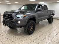 Among midsize pickups that talk tough but feel soft when the work gets real, this 2021 Toyota Tacoma... (image 1)