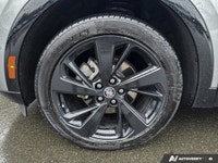 This 2023 Buick Envision Essence SUV is a head-turner, boasting a sleek Moonstone Grey Metallic exte... (image 8)