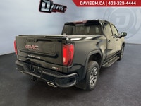 The 2024 GMC Sierra 1500 AT4 Crew Cab Short Box 4WDblends premium craftsmanship, rugged off-road cap... (image 4)