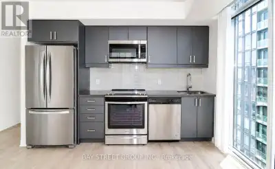 Welcome to this exceptional high-floor residence located directly at Wellesley Subway Station, offer...