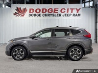 The 2018 Honda CR-V Touring AWD delivers premium comfort, advanced safety, and confident all-weather... (image 1)