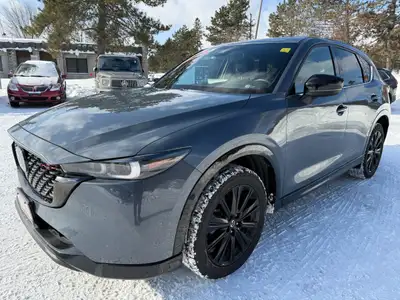WAS: $30998 NOW: $28888 plus taxes and licensing feesSporty & Sophisticated! 2023 Mazda CX-5 Sport D...