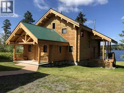 Waterfront Luxury & Craftsmanship - This stunning log home on the lake holds nothing back. Geotherma...