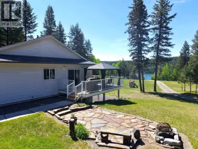 Where your fence line ends, Crown Land begins. This 6.27-acre property backs onto Cariboo wilderness...