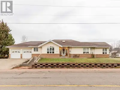 * PREC - Personal Real Estate Corporation. Custom built rancher with full basement in Silver King su...