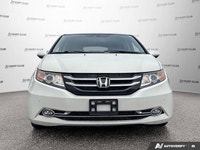 Simplify family journeys with the 2016 Honda Odyssey Touring. This white minivan, with 157,038 kilom... (image 9)