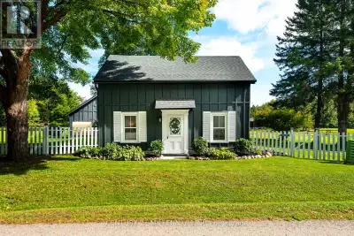 Behind a dreamy white picket fence and a canopy of towering trees, lies this piece of local history...