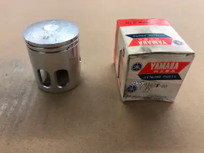 NOS OEM Yamaha 1st over piston fits 1977 /78/79 YZ80 2J5-11635-00 piston only NO RINGS. Part # 2J5-1...