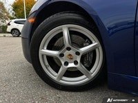 Feel the exhilaration of the open road with this stunning 2020 Porsche 718 Cayman in vibrant Gentian... (image 9)