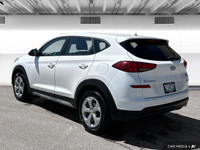 The 2020 Hyundai Tucson in Crystal White features all-wheel drive with advanced safety like lane dep... (image 3)