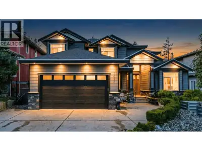 JAY CRESCENT STUNNER! Backing onto greenspace, this home boasts 4 upstairs ensuite bedrooms, includi...