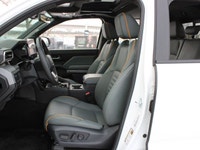 This 2024 Toyota Tacoma Hybrid Trailhunter is a one-owner, accident-free adventure truck with low ki... (image 2)