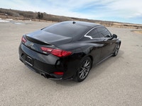 The 2017 Infiniti Q60 Premium is a luxurious 2-door coupe, often featuring a 300-horsepower 3.0L twi... (image 7)